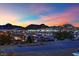 Community view with mountains in the background at sunset at 624 Via Colmo Ave, Henderson, NV 89011