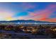 Panoramic city views at sunset with distant mountains in background at 624 Via Colmo Ave, Henderson, NV 89011