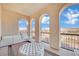 Private balcony with mountain views and seating at 624 Via Colmo Ave, Henderson, NV 89011