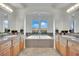 Bathroom with granite counters, double sinks, and soaking tub at 624 Via Colmo Ave, Henderson, NV 89011