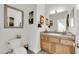 Well-appointed bathroom with wood vanity and granite countertop at 624 Via Colmo Ave, Henderson, NV 89011