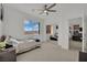 Bright bedroom with mirrored closet doors and neutral decor at 624 Via Colmo Ave, Henderson, NV 89011