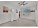 Spacious bedroom with white dresser and city-themed artwork at 624 Via Colmo Ave, Henderson, NV 89011