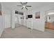 Bright bedroom with mirrored closet doors and neutral carpeting at 624 Via Colmo Ave, Henderson, NV 89011