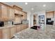 Well-equipped kitchen with granite counters and custom cabinetry at 624 Via Colmo Ave, Henderson, NV 89011