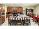 Kitchen island with granite countertop and seating for three at 6436 Emerson St, Pahrump, NV 89048