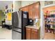 Stainless steel refrigerator and ample kitchen storage at 6436 Emerson St, Pahrump, NV 89048