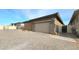 Attached garage with brick facade and paved driveway at 746 Agave Falls St, Henderson, NV 89011