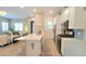 Modern kitchen with white cabinets and subway tile backsplash at 746 Agave Falls St, Henderson, NV 89011