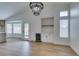 Bright dining area with a built-in wine cooler and stylish chandelier at 7812 Desert Candle Way, Las Vegas, NV 89128