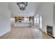 Open concept dining area with kitchen island and wine storage at 7812 Desert Candle Way, Las Vegas, NV 89128