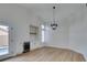 Elegant dining room with chandelier and built-in cabinetry at 7812 Desert Candle Way, Las Vegas, NV 89128