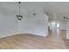 Formal dining room featuring hardwood floors and chandelier at 7812 Desert Candle Way, Las Vegas, NV 89128