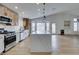 Updated kitchen featuring a large island and modern finishes at 7812 Desert Candle Way, Las Vegas, NV 89128