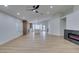 Bright and airy living room with hardwood floors and fireplace at 7812 Desert Candle Way, Las Vegas, NV 89128