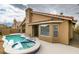 Inviting backyard oasis with a sparkling pool and relaxing spa at 7812 Desert Candle Way, Las Vegas, NV 89128