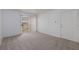 Spacious carpeted bedroom with sliding glass door at 7885 W Flamingo Rd # 1092, Las Vegas, NV 89147