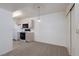 Dining area with kitchen and carpeted floor at 7885 W Flamingo Rd # 1092, Las Vegas, NV 89147