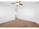 Well-lit bedroom featuring ceiling fan and carpet flooring at 8322 Rygate Ave, Las Vegas, NV 89178