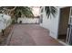 Sliding glass door opens to the paver patio and concrete extension in the backyard at 8416 Shore Breeze Dr, Las Vegas, NV 89128