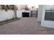 Paver patio area in the backyard is surrounded by a privacy wall at 8416 Shore Breeze Dr, Las Vegas, NV 89128