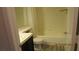 Well-lit bathroom with tub/shower combination and modern fixtures at 8416 Shore Breeze Dr, Las Vegas, NV 89128