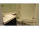 Bathroom featuring dual sinks, a large mirror, and a bathtub at 8416 Shore Breeze Dr, Las Vegas, NV 89128