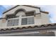 Home exterior featuring a tile roof and textured facade at 8416 Shore Breeze Dr, Las Vegas, NV 89128