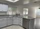 Modern kitchen with stainless steel appliances and granite countertops at 8416 Shore Breeze Dr, Las Vegas, NV 89128