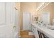 Modern bathroom with double vanity and updated fixtures at 8437 Sluman Ct, Las Vegas, NV 89128