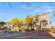 Townhouse exterior with landscaping and parking at 8437 Sluman Ct, Las Vegas, NV 89128