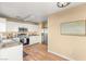 Well-equipped kitchen with white cabinets and granite countertops at 8437 Sluman Ct, Las Vegas, NV 89128