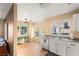 Bright kitchen with white cabinets and stainless steel appliances at 8437 Sluman Ct, Las Vegas, NV 89128