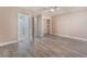 A bright bedroom featuring modern flooring, neutral walls, and closet space with an ensuite bathroom at 8617 Prairie Hill Dr, Las Vegas, NV 89134