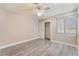 Bright bedroom with a ceiling fan, closet, and large window with natural light at 8617 Prairie Hill Dr, Las Vegas, NV 89134