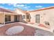 Charming home exterior with a tile roof, security doors, and a low-maintenance gravel front yard at 8617 Prairie Hill Dr, Las Vegas, NV 89134