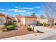 Charming single-story home with a well-kept front yard and attached one-car garage on a sunny day at 8617 Prairie Hill Dr, Las Vegas, NV 89134