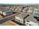 Aerial view of houses in a new development, showcasing the community and surrounding landscape at 8749 Black Cordon Rd, Las Vegas, NV 89139