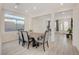 Bright dining room with table and chairs at 8749 Black Cordon Rd, Las Vegas, NV 89139