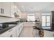 Kitchen with granite countertops and island at 8749 Black Cordon Rd, Las Vegas, NV 89139