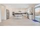 Spacious kitchen features an island with seating and stainless steel appliances at 8749 Black Cordon Rd, Las Vegas, NV 89139