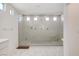 Large walk-in shower with multiple shower heads at 8749 Black Cordon Rd, Las Vegas, NV 89139