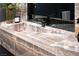 Unique bathroom with a large onyx sink and modern faucet at 8913 Canyon Springs Dr, Las Vegas, NV 89117