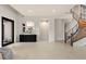 Bright and airy entryway with modern console table and staircase at 8913 Canyon Springs Dr, Las Vegas, NV 89117