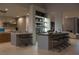 Open concept kitchen with two islands and ample counter space at 8913 Canyon Springs Dr, Las Vegas, NV 89117