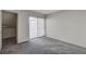 Bright bedroom featuring a sliding glass door and closet at 8945 Clairton Ct, Las Vegas, NV 89117