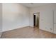 Bright bedroom with laminate wood floor and spacious closet at 8945 Clairton Ct, Las Vegas, NV 89117