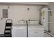 Laundry area with washer, dryer and water heater at 8945 Clairton Ct, Las Vegas, NV 89117