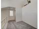 Loft bedroom with grey carpet and window for natural light at 8945 Clairton Ct, Las Vegas, NV 89117