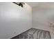 Spacious loft area with grey carpeting and multiple windows at 8945 Clairton Ct, Las Vegas, NV 89117